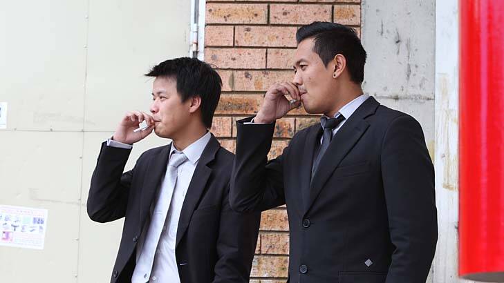 No intention of giving up … Thien Nguyen and Kevin Chou on Friday in Fairfield, where almost 48 per cent of Vietnamese-speaking migrant men smoke.