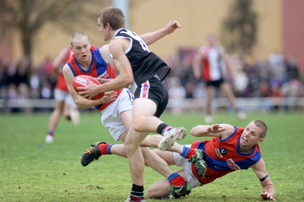 Action at the Horsham District Football League grand final at Horsham City Oval. Picture: SAMANTHA CAMARRI