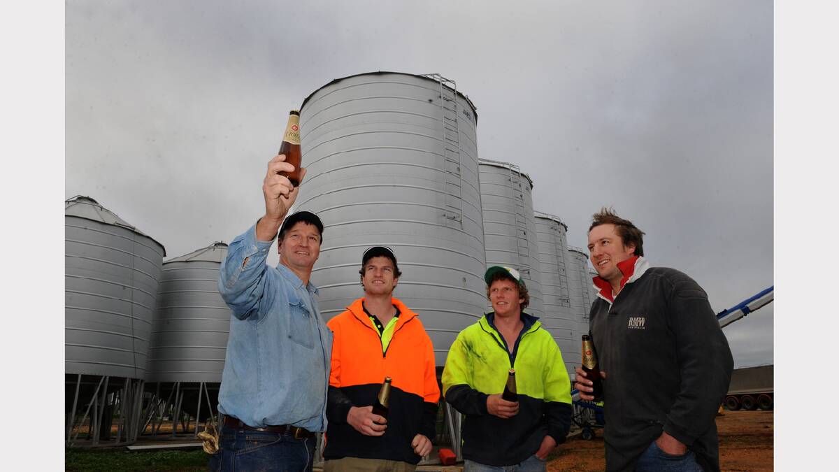 Andrew Weidemann with son Matt Weidemann, Jackson Falls and Nick Zordan. Mr Weidemann  sells his barley directly to CUB to make Crown Lager and will be the face of the relaunched brew. Picture:  PAUL CARRACHER