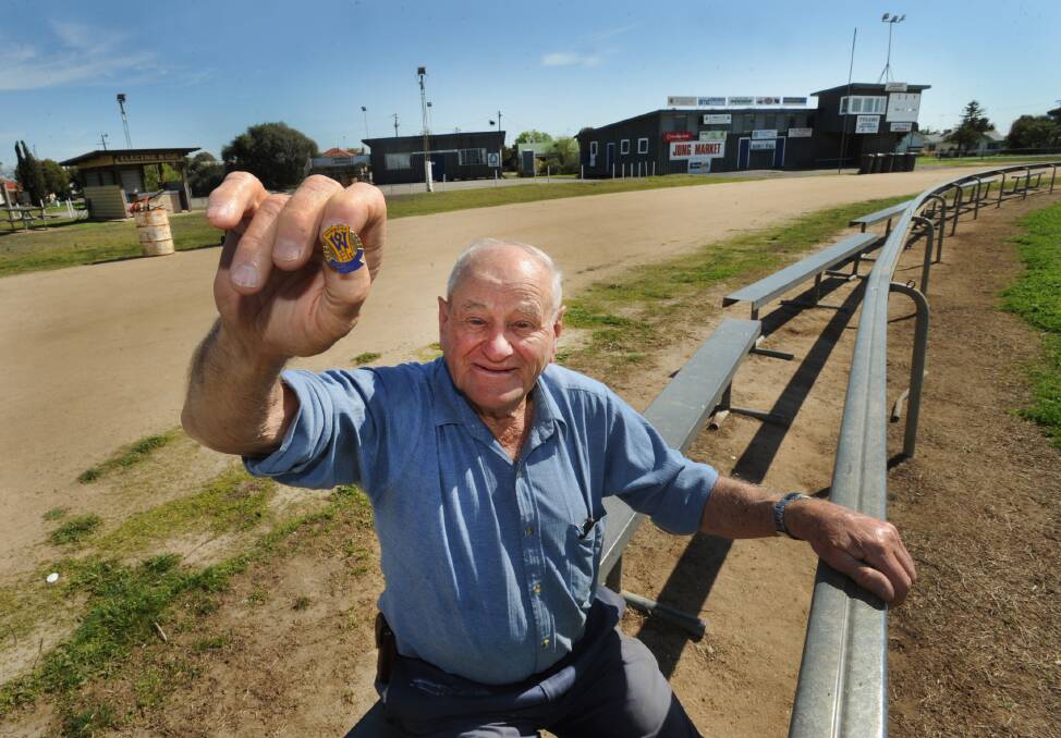 FOUND IT: Former Minyip footballer Ken 'Dasher' Milgate was reunited with his Wimmera Football League legend badge on Tuesday. Milgate lost his precious badge while watching football at Minyip Recreation Reserve on Saturday. A young Minyip resident with a metal detector discovered the lost badge on Monday night. Picture: PAUL CARRACHER