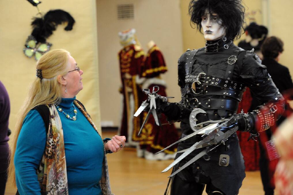 Carol Welbourn admires a Jack Sparrow costume. Award-winning haute couturier Hilary Willowsmith of Warracknabeal exhibit. 