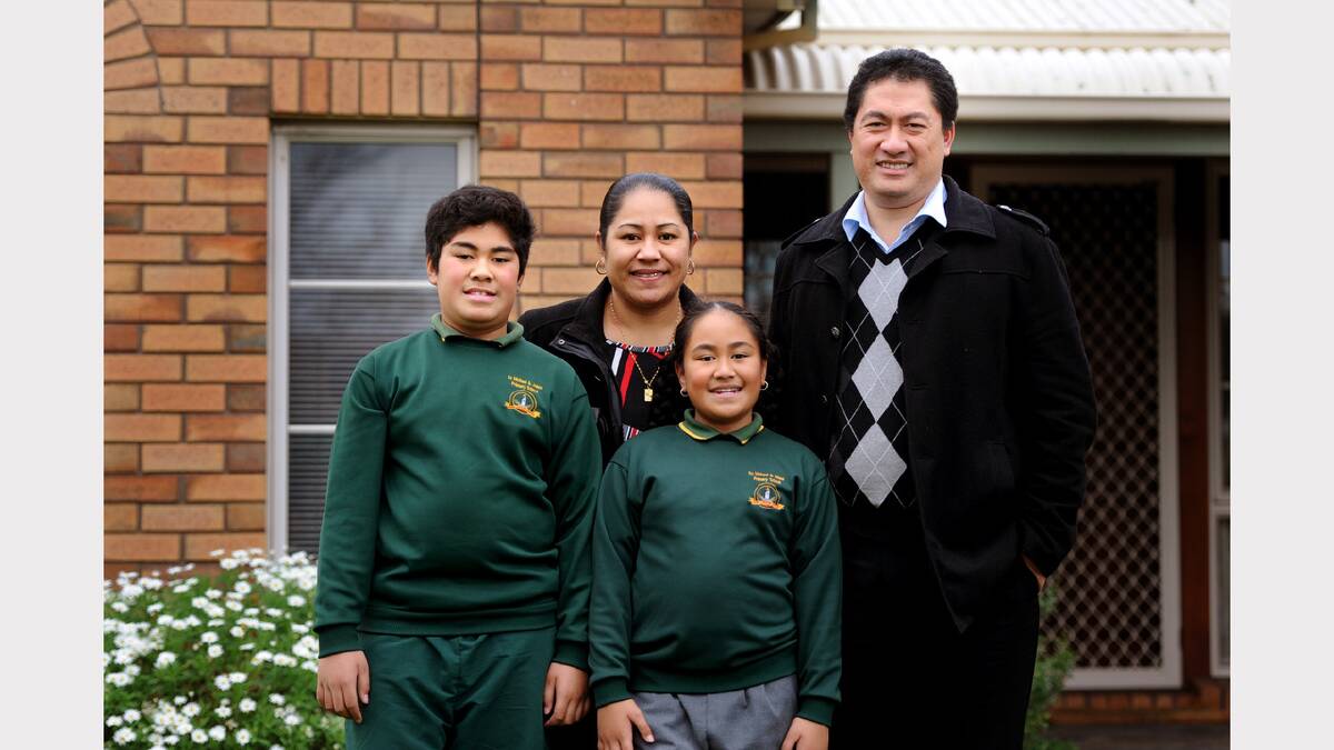 HAPPY FAMILY: Rev Tupe Ioelu and his wife, Ala, with their two children, Wily, 10, and Catherine, 8, have been living in Horsham for 12 months. Picture: SAMANTHA CAMARRI.