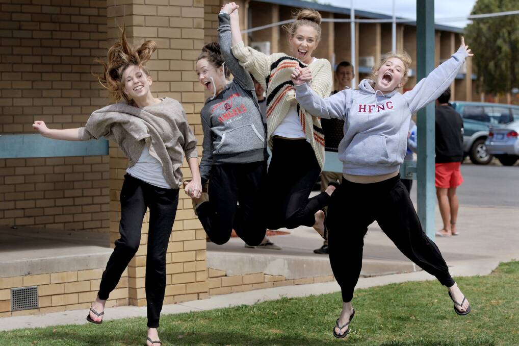 Horsham College year 12 students Kimberley Crabtree, Abbey Patterson, Georgia Francis and Becky Schmidt celebrate the end of their three-hour English exam.