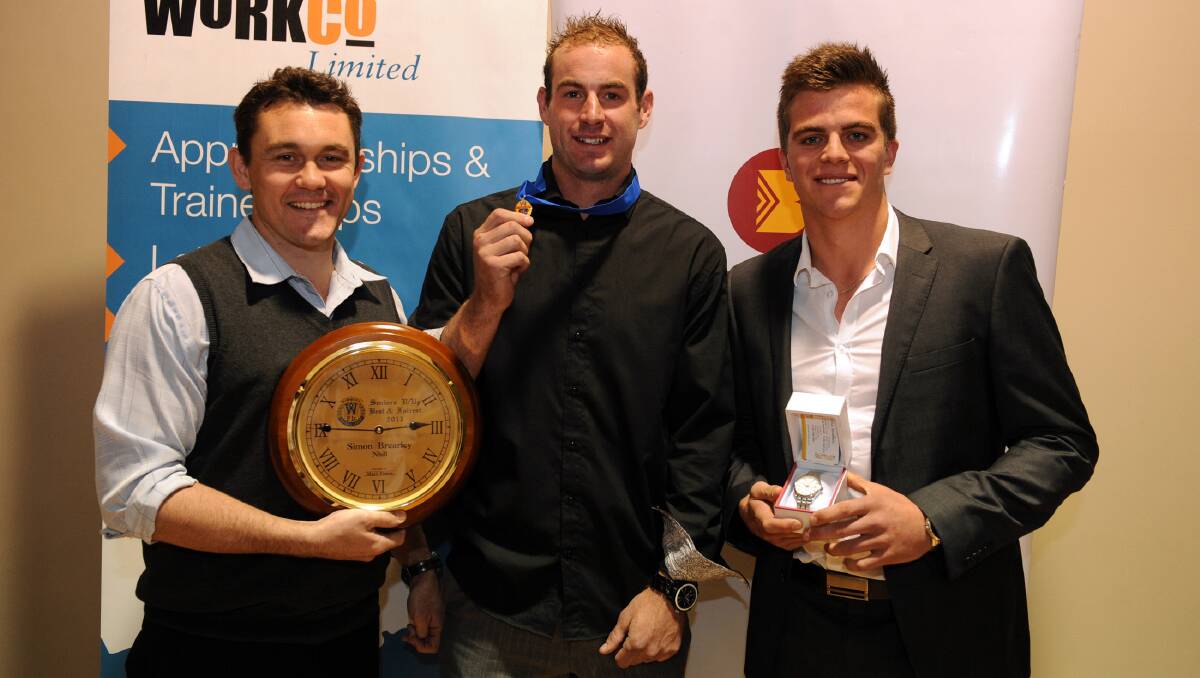 ROO BEAUTY: Dimboola’s Justin Chilver, centre, and Ryan Bell, right, were named Toohey Medallist and best under-21 player respectively on Monday night. Nhill’s Simon Brearley, on 18 votes, finished runner-up to Chilver. Picture: PAUL CARRACHER
