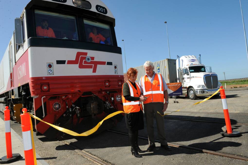 FREIGHT TERMINAL: Wimmera Container Line owner Rodney and Jenny Clarke welcome the first official train and load to the Dooen site in September last year. Picture: PAUL CARRACHER