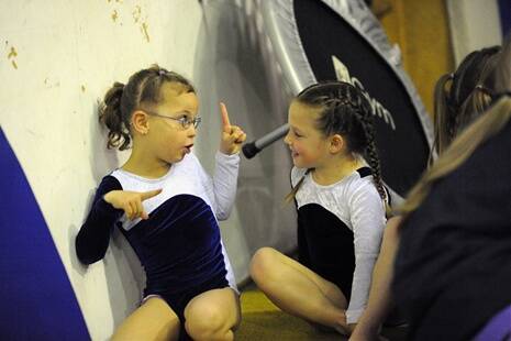 Zarlie Patterson and Arwyn McInnes between events at Natimuk Gymastics Club competition.